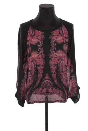 Blouse en soie  Barbara Bui noir. Matière principale soie. Taille 42.