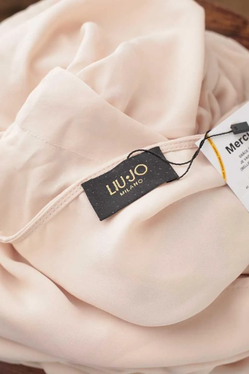 Blouse Liu Jo beige. Matière principale polyester. Taille 36.