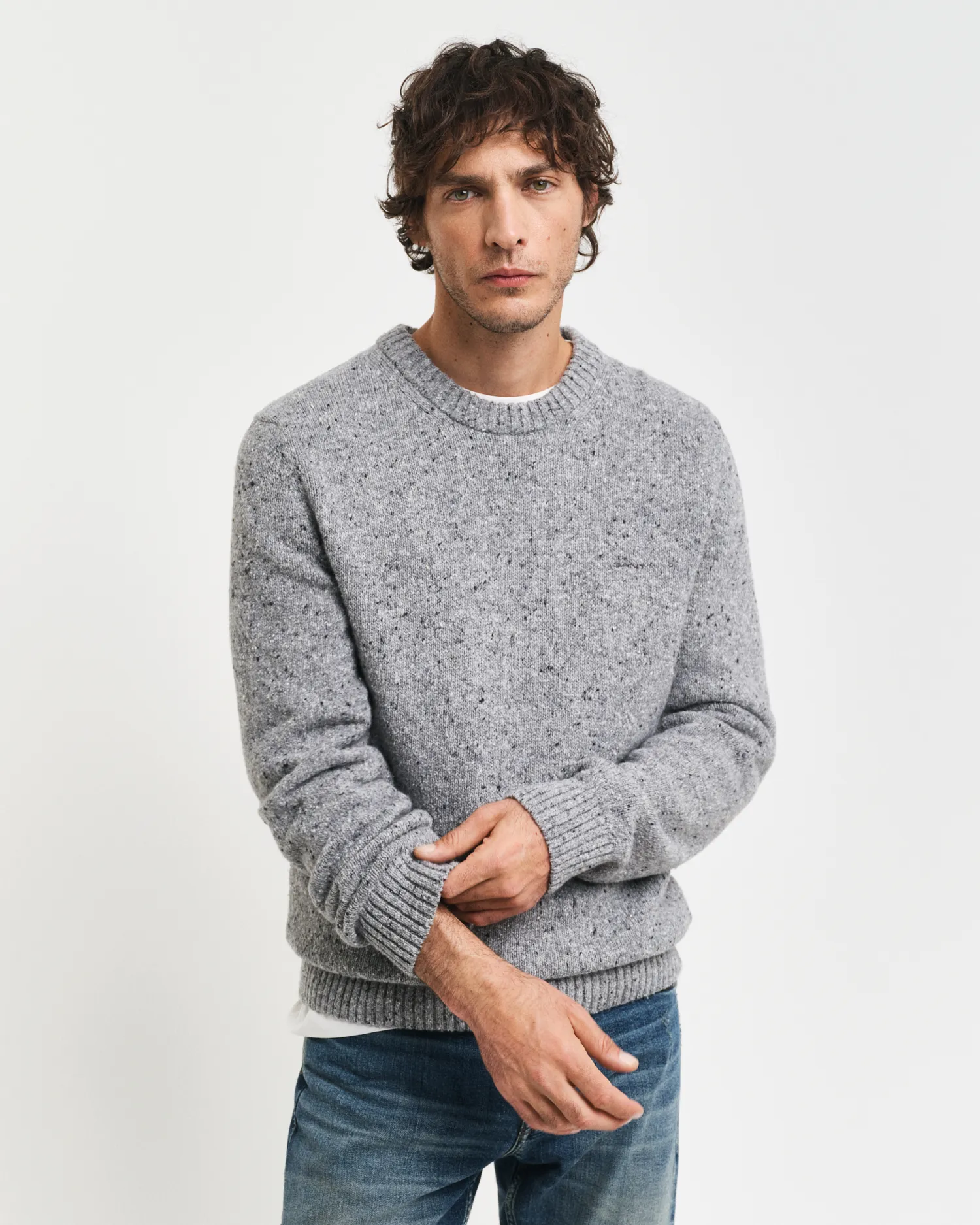 Pull ras du cou en laine mouchetée